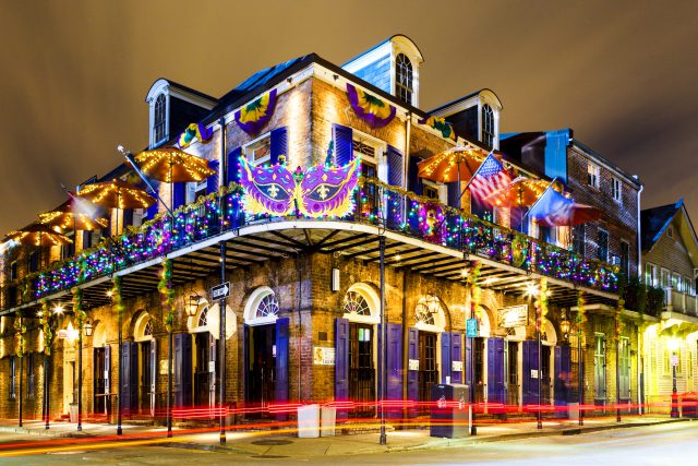 New Orleans, Louisiana USA- Jan 23 2016: Pubs and Bars having colorful lights and decorations in the French Quarter. Tourism provides a much needed financial source, also home for great many musicians.
