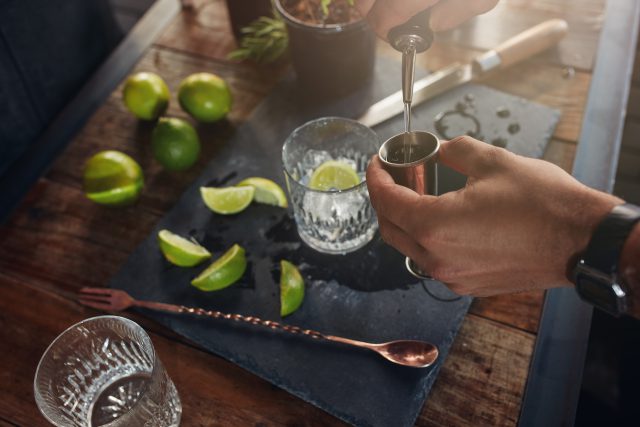 Cocktail Sweetener - Bartender Mixing a Drink