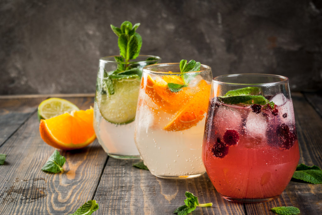 tequila kombucha cocktails on wood table